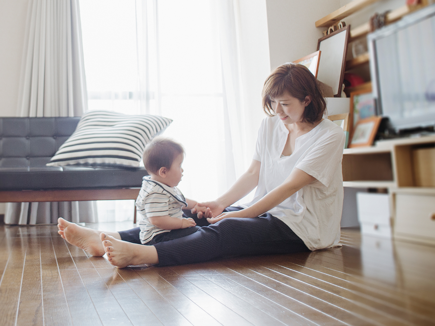 Mom and baby playing on the floor