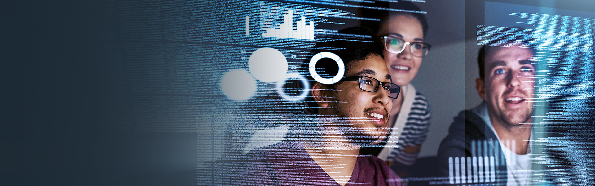 3 tech professionals looking at a screen